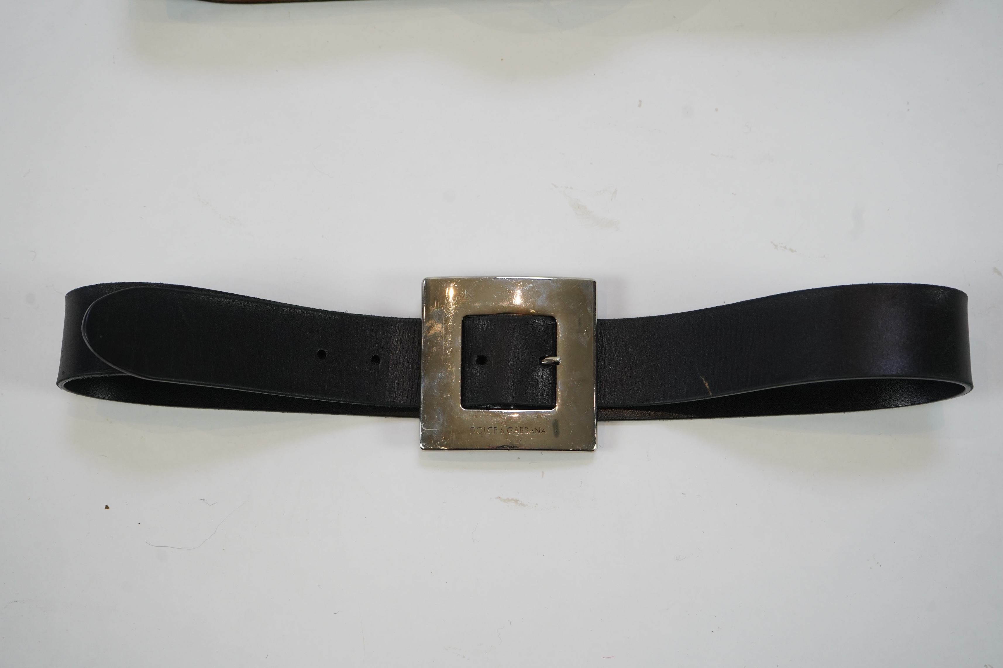 Two lady's Dolce & Gabbana black leather belts with silver metal buckles size 42/90